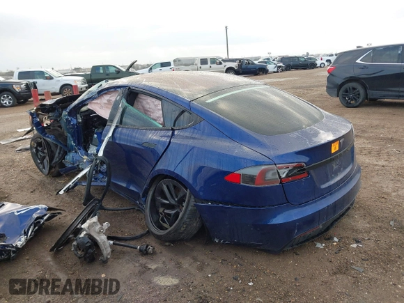 2021 Tesla Model S Long Range with VIN 5YJSA1E50MF432224, listed as a IAAI auction lot 41417130 with Not provided miles and . Bid and sale history available at DreamBid. Image 14.