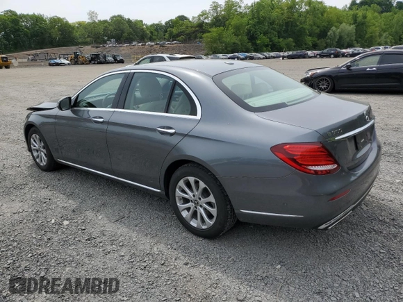 2018 Mercedes-Benz E 300 with VIN WDDZF4KBXJA337966, listed as a Copart auction lot 58718355 with 54,264 mi miles and Salvage title. Bid and sale history available at DreamBid. Image 2.