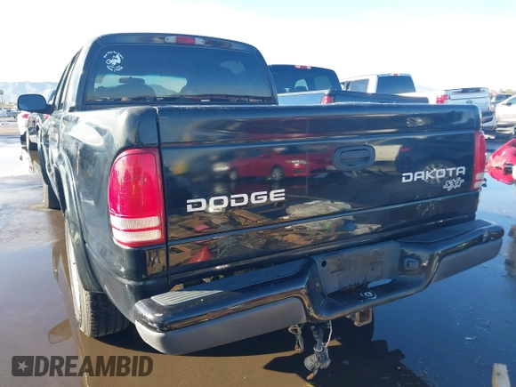 2003 Dodge Dakota Sport with VIN 1D7HL38X53S381338, listed as a IAAI auction lot 38840426 with 130,846 mi miles. Bid and sale history available at carsss.com. Image 16.