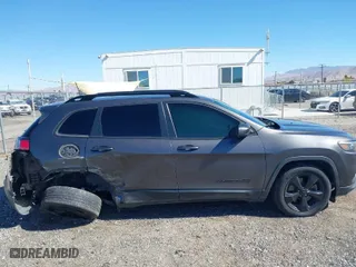 2019 Jeep Cherokee Latitude Plus with VIN 1C4PJLLB2KD438654, listed as a IAAI auction lot 41642098 with 69,678 mi miles. Bid and sale history available at carsss.com. Image 13.