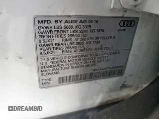 2018 Audi Q7 Prestige z VIN WA1VAAF73JD050330, wystawiony jako Copart lot #59612405 z przebiegiem 72 231 mil mil oraz Szkoda całkowita • Salvage title. Historia ofert i sprzedaży dostępna na DreamBid. Obrazek 13.