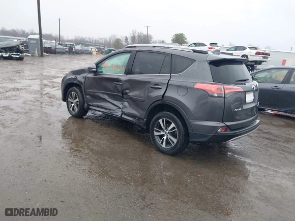 2018 Toyota RAV4 XLE with VIN 2T3RFREV5JW798328, listed as a IAAI auction lot 41868104 with 61,076 mi miles. Bid and sale history available at carsss.com. Image 3.