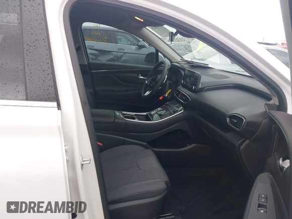 2023 Hyundai Santa Fe SE with VIN 5NMS14AJ3PH637561, listed as a IAAI auction lot 41905620 with 5,937 mi miles and . Bid and sale history available at DreamBid. Image 5.