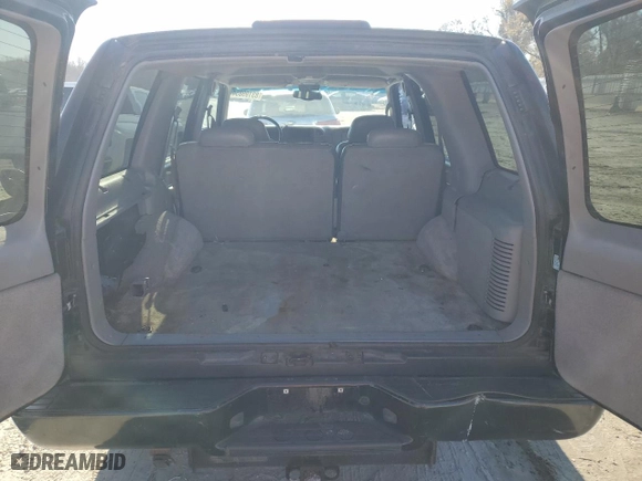 2000 Chevrolet Tahoe Limited with VIN 1GNEC13R5YR162203, listed as a Copart auction lot 83199854 with 347,572 mi miles and Salvage Title. Bid and sale history available at carsss.com. Image 6.