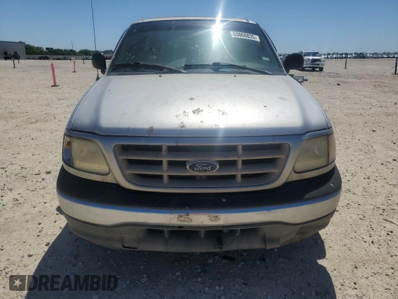 2000 Ford F-150 XL with VIN 1FTZF1722YKA51583, listed as a Copart auction lot 53860835 with 163,877 mi miles and Clean title. Bid and sale history available at DreamBid. Image 5.