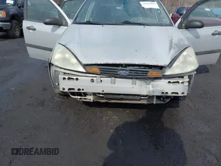 2001 Ford Focus LX with VIN 1FAFP33P31W297608, listed as a IAAI auction lot 41663965 with 142,898 mi miles and . Bid and sale history available at carsss.com. Image 6.