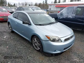 2006 Scion tC with VIN JTKDE177060139736, listed as a IAAI auction lot 41528668 with 155,283 mi miles. Bid and sale history available at carsss.com. Image 1.