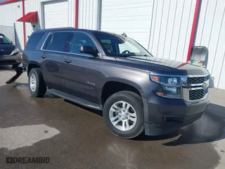 2018 Chevrolet Tahoe LT with VIN 1GNSKBKC4JR261190, listed as a IAAI auction lot 41548734 with 142,800 mi miles. Bid and sale history available at carsss.com. Image 1.