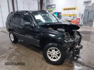 2004 Jeep Grand Cherokee Laredo with VIN 1J4GW48S34C387815, listed as a IAAI auction lot 41259911 with 1 mi miles. Bid and sale history available at carsss.com. Image 1.
