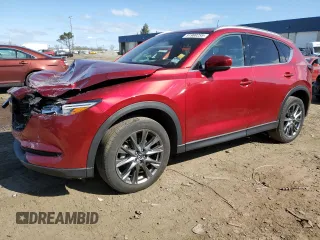 2021 Mazda CX-5 Signature with VIN JM3KFBEYXM0434778, listed as a Copart auction lot 51980255 with 34,283 mi miles and Salvage Title. Bid and sale history available at carsss.com. Image 1.