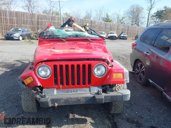 2004 Jeep Wrangler Sport with VIN 1J4FA49S14P803149, listed as a IAAI auction lot 42022481 with Not Provided miles. Bid and sale history available at carsss.com. Image 12.