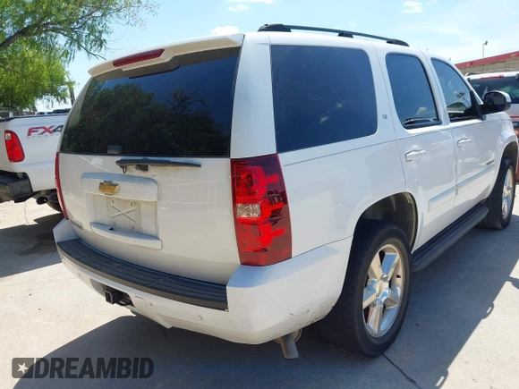 2007 Chevrolet Tahoe LS with VIN 1GNFC13007R310861, listed as a IAAI auction lot 42621401 with 241,291 mi miles and . Bid and sale history available at DreamBid. Image 4.