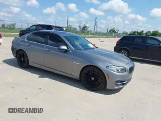 2014 BMW 5 Series 535i with VIN WBA5B1C50ED482592, listed as a IAAI auction lot 42389417 with 154,427 mi miles and . Bid and sale history available at DreamBid. Image 1.