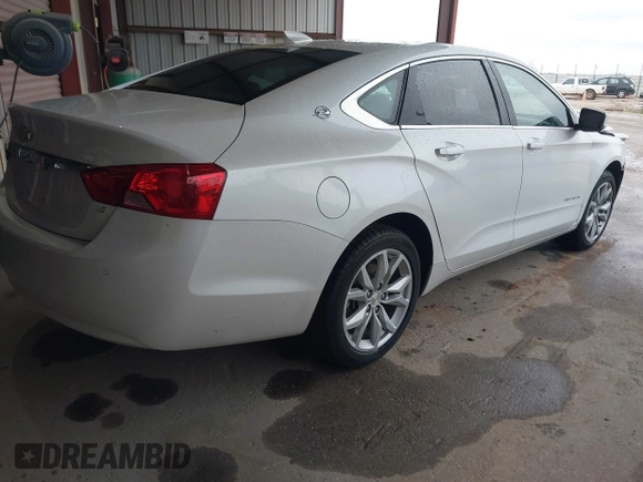 2016 Chevrolet Impala LT with VIN 2G1105SA6G9146418, listed as a IAAI auction lot 41608724 with 124,915 mi miles and . Bid and sale history available at DreamBid. Image 4.