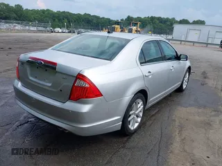 2012 Ford Fusion SEL with VIN 3FAHP0JAXCR359565, listed as a IAAI auction lot 42609189 with 211,017 mi miles and . Bid and sale history available at DreamBid. Image 4.