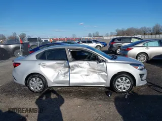 2023 Kia Rio LX with VIN 3KPA24ADXPE606463, listed as a IAAI auction lot 41728523 with 8,909 mi miles and . Bid and sale history available at DreamBid. Image 13.