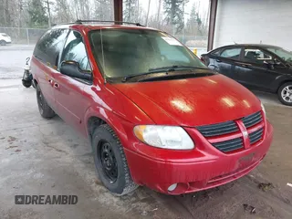 2005 Dodge Caravan SXT with VIN 2D4GP44LX5R210076, listed as a IAAI auction lot 41856927 with 291,712 mi miles and . Bid and sale history available at carsss.com. Image 1.