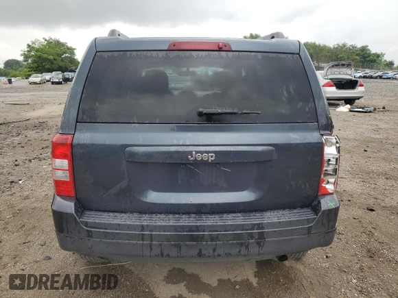 2014 Jeep Patriot Sport with VIN 1C4NJPBA0ED601488, listed as a Copart auction lot 63791785 with 204,926 mi miles and Salvage title. Bid and sale history available at DreamBid. Image 6.