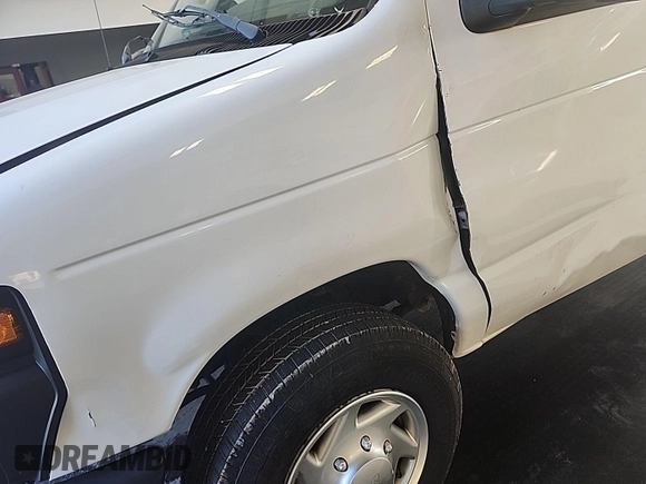 2010 Ford Econoline Cargo Commercial with VIN 1FTNE2EW4ADA72071, listed as a IAAI auction lot 42598880 with 186,263 mi miles and . Bid and sale history available at DreamBid. Image 32.