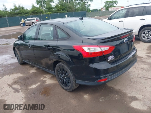2012 Ford Focus SE with VIN 1FAHP3F22CL249739, listed as a IAAI auction lot 42538870 with 171,975 mi miles and . Bid and sale history available at DreamBid. Image 3.