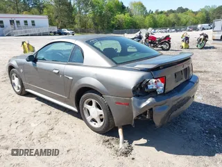 2004 Ford Mustang Standard z VIN 1FAFP40644F236905, wystawiony jako IAAI lot #42016081 z przebiegiem 167 733 mil mil oraz . Historia ofert i sprzedaży dostępna na DreamBid. Obrazek 3.