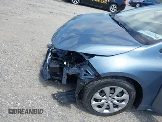 2021 Toyota Corolla LE with VIN JTDEPMAE7MJ144664, listed as a IAAI auction lot 42269698 with 23,500 mi miles and . Bid and sale history available at DreamBid. Image 19.