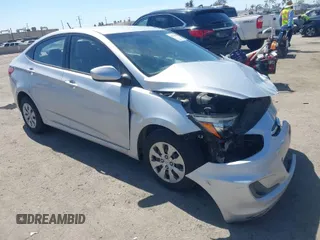 2016 Hyundai Accent SE with VIN KMHCT4AE1GU965566, listed as a IAAI auction lot 41871880 with 83,221 mi miles. Bid and sale history available at carsss.com. Image 1.