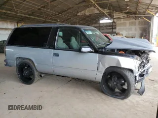 1998 Chevrolet Tahoe with VIN 3GNEC18R3WG122904, listed as a Copart auction lot 57752554 with 229,646 mi miles and Salvage title. Bid and sale history available at DreamBid. Image 4.