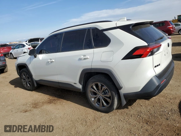 2022 Toyota RAV4 Hybrid XLE Premium with VIN JTMB6RFV1ND521761, listed as a Copart auction lot 54263055 with 46,391 mi miles and Salvage title. Bid and sale history available at DreamBid. Image 2.