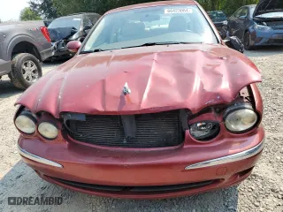 2006 Jaguar X-Type with VIN SAJWA51A16WE85139, listed as a Copart auction lot 66423084 with 137,318 mi miles and Salvage Title. Bid and sale history available at carsss.com. Image 5.