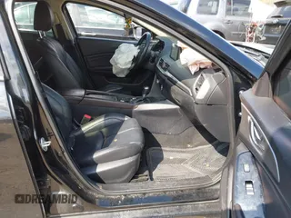 2018 Mazda 3 Touring with VIN 3MZBN1V34JM261565, listed as a IAAI auction lot 41795238 with 121,112 mi miles. Bid and sale history available at carsss.com. Image 5.