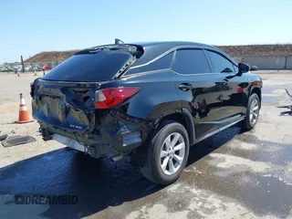 2016 Lexus RX 350 z VIN 2T2BZMCA6GC002373, wystawiony jako IAAI lot #42356683 z przebiegiem 107 067 mil mil oraz . Historia ofert i sprzedaży dostępna na DreamBid. Obrazek 4.