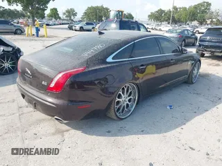 2013 Jaguar XJ Portfolio with VIN SAJWJ2GD2D8V44780, listed as a IAAI auction lot 41875069 with 87,806 mi miles and . Bid and sale history available at DreamBid. Image 4.