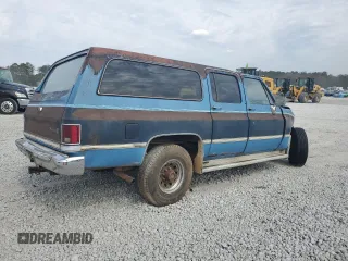 1985 GMC Suburban z VIN 1G5GC26M0FF525438, wystawiony jako Copart lot #47074415 z przebiegiem 5135 mil mil oraz Szkody całkowita. Historia ofert i sprzedaży dostępna na DreamBid. Obrazek 3.