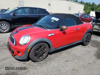 2013 MINI Roadster S z VIN WMWSY3C58DT594039, wystawiony jako Copart lot #65833804 z przebiegiem Nie podano mil oraz Szkody całkowita. Historia ofert i sprzedaży dostępna na DreamBid. Obrazek 1.
