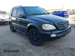 2004 Mercedes-Benz M 3.5L with VIN 4JGAB57E24A505420, listed as a IAAI auction lot 42070034 with 228,002 mi miles. Bid and sale history available at carsss.com. Image 1.