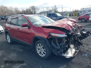 2014 Jeep Cherokee Latitude z VIN 1C4PJMCSXEW141453, wystawiony jako IAAI lot #41975311 z przebiegiem 150 085 mil mil oraz . Historia ofert i sprzedaży dostępna na DreamBid. Obrazek 1.