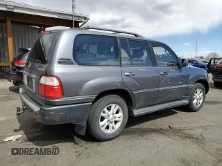 2003 Lexus LX 470 z VIN JTJHT00W633531685, wystawiony jako Copart lot #49729305 z przebiegiem 237 447 mil mil oraz Szkoda całkowita • Salvage title. Historia ofert i sprzedaży dostępna na DreamBid. Obrazek 3.