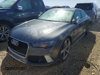 2016 Audi RS 7 Prestige z VIN WUAW2AFC2GN900328, wystawiony jako Copart lot #74450074 z przebiegiem Nie podano mil oraz Nie do naprawy. Historia ofert i sprzedaży dostępna na DreamBid. Obrazek 1.