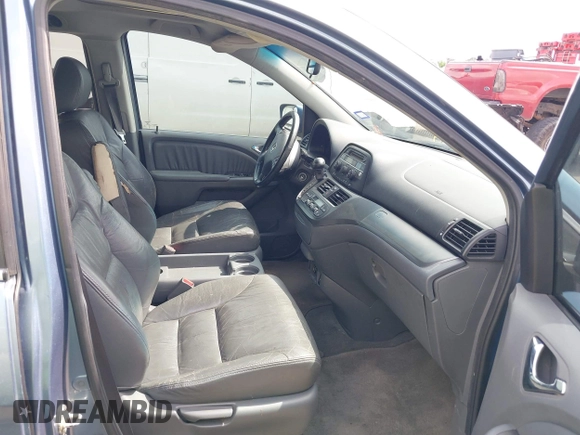 2007 Honda Odyssey EX-L with VIN 5FNRL38647B085123, listed as a IAAI auction lot 42154519 with 168,587 mi miles and . Bid and sale history available at carsss.com. Image 5.