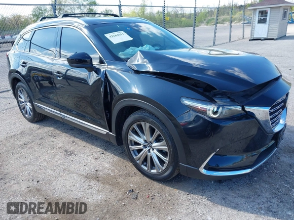 2021 Mazda CX-9 Signature with VIN JM3TCBEY1M0539786, listed as a IAAI auction lot 42264611 with 51,168 mi miles and . Bid and sale history available at DreamBid. Image 1.