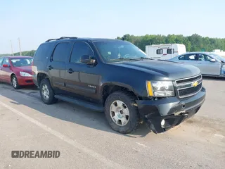 2014 Chevrolet Tahoe LT with VIN 1GNSCBE01ER235571, listed as a IAAI auction lot 42403118 with 238,069 mi miles and . Bid and sale history available at DreamBid. Image 1.