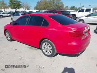 2011 Volkswagen Jetta SE z VIN 3VWDX7AJ1BM056944, wystawiony jako IAAI lot #41782376 z przebiegiem 127 336 mil mil oraz . Historia ofert i sprzedaży dostępna na DreamBid. Obrazek 3.