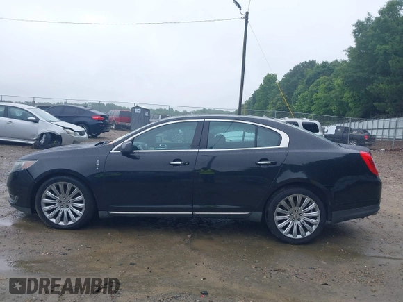 2014 Lincoln MKS z VIN 1LNHL9DK0EG610145, wystawiony jako IAAI lot #42348345 z przebiegiem 61 289 mil mil oraz . Historia ofert i sprzedaży dostępna na DreamBid. Obrazek 15.