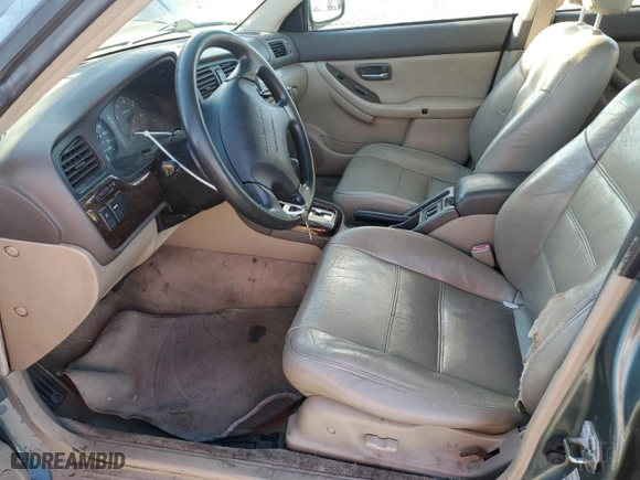 2000 Subaru Legacy Wagon Outback w/RB Equip with VIN 4S3BH6657Y7620094, listed as a Copart auction lot 48182655 with 296,942 mi miles and Salvage Title. Bid and sale history available at carsss.com. Image 7.