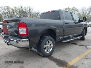 2023 Ram 2500 Big Horn with VIN 3C6UR5DL8PG611061, listed as a IAAI auction lot 41911153 with 49,055 mi miles. Bid and sale history available at carsss.com. Image 4.