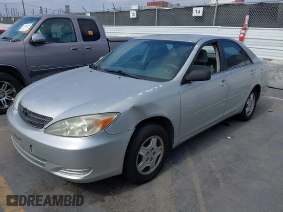 2003 Toyota Camry LE z VIN 4T1BF32K33U044476, wystawiony jako IAAI lot #42464651 z przebiegiem 206 004 mil mil oraz . Historia ofert i sprzedaży dostępna na DreamBid. Obrazek 6.