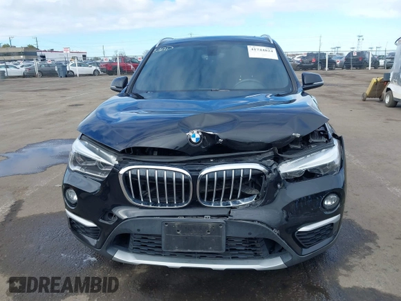 2017 BMW X1 sDrive28i with VIN WBXHU7C3XHP924635, listed as a IAAI auction lot 41744824 with 74,143 mi miles. Bid and sale history available at carsss.com. Image 12.