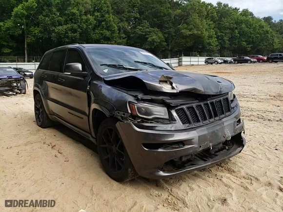 2015 Jeep Grand Cherokee SRT with VIN 1C4RJFDJ9FC842448, listed as a Copart auction lot 56956284 with 178,141 mi miles and Salvage Title. Bid and sale history available at carsss.com. Image 11.
