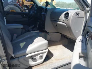 2005 GMC Envoy SLE with VIN 1GKDS13S652390259, listed as a IAAI auction lot 41825258 with 162,172 mi miles. Bid and sale history available at carsss.com. Image 5.
